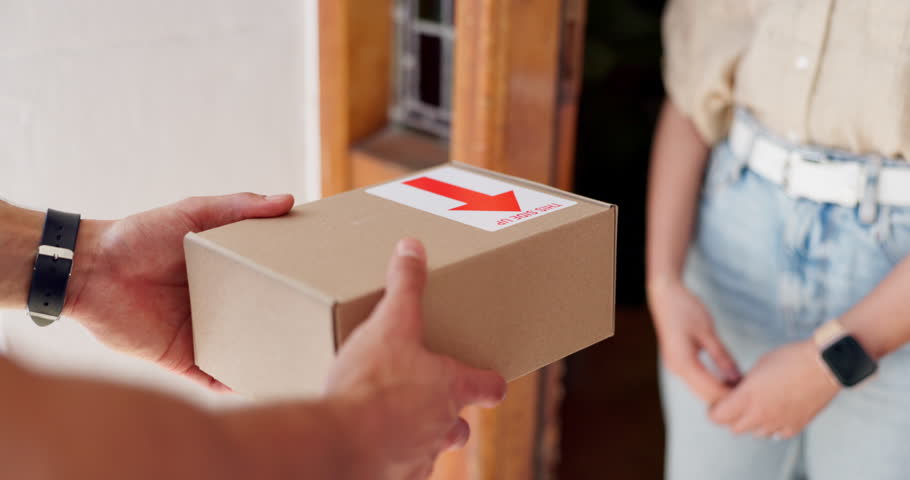 Hands, box and delivery to customer at front door for ecommerce, shipping and logistics. Courier, woman and giving parcel or package for order, shopping and fast distribution service at home closeup