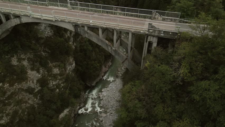 Bridge over mountain gorge in Dolomites near Villa Banale