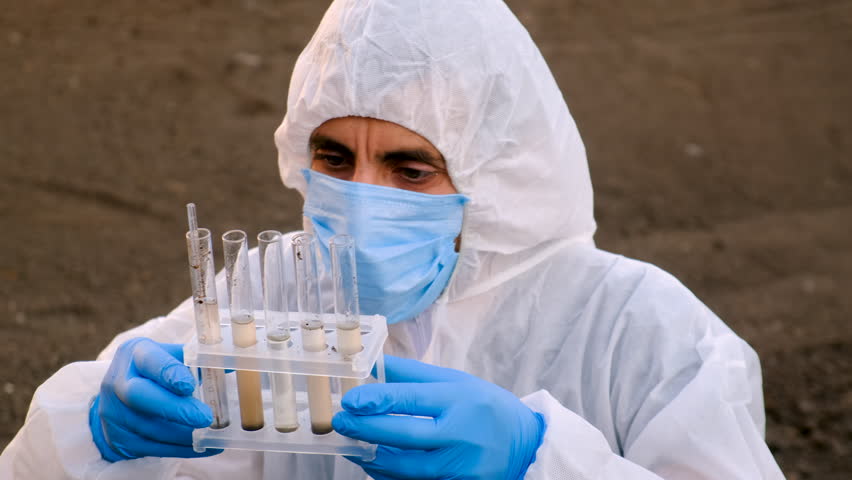 Taking soil samples in nature. Selective focus.