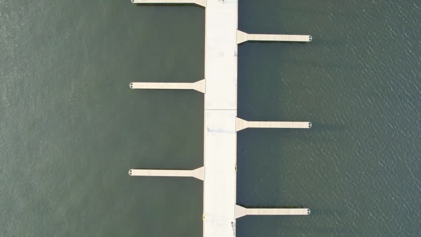 Drone footage. Ship pier at sunset