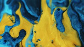 Ink glitter drip. Acryl fluid art. Defocused blue yellow gold black color shimmer spill liquid oil mix bubble emulsion abstract background. - Powered by Shutterstock - Get 15% off with code: PIKWIZARD15