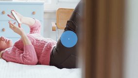 Animation of network of connections with music icons over caucasian woman using smartphone. Global connections, computing and data processing concept digitally generated video. - Powered by Shutterstock - Get 15% off with code: PIKWIZARD15