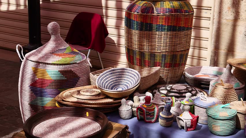 A variety of colorful woven baskets on display