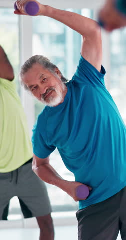 Fitness, senior man and stretch with dumbbell for wellness, coordination or balance with endurance. Class, exercise or male person with weightlifting for muscle strength, aerobic or physical training
