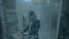 Animation of virus warning text and data processing over biracial businesswoman by servers. Global finance, business, connections, computing and data processing concept digitally generated video. - Powered by Shutterstock - Get 15% off with code: PIKWIZARD15