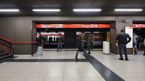 MILAN, ITALY - MARCH 23: Commuters in subway station on March 23, 2013 in Milan, Italy. Milan underground is spread over three lines for a total of about 76 km long and 84 stations in operation. 