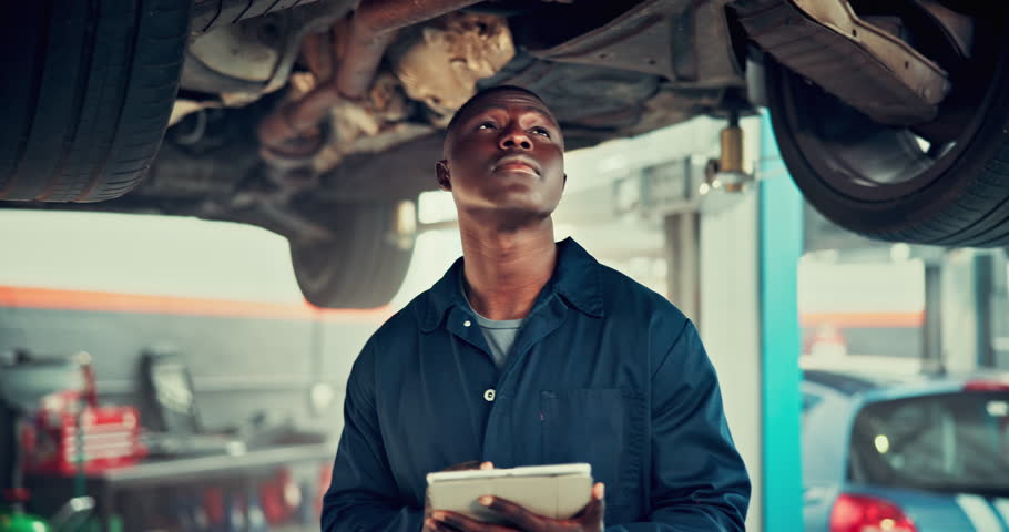 Mechanic, tablet and results with black man and car in auto repair shop for diagnostic system, transport or calibration. Engineer, maintenance or motor technician with person in garage for inspection
