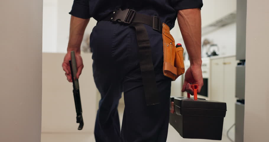 Plumbing, man and hands with toolbox in kitchen for home repair, renovation and maintenance service. Plumber, contractor and small business owner with tools in house for upgrade, improvement and work