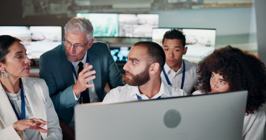 Security, discussion and team at computer in control room for planning, defence strategy or satellite video cctv. Government, digital surveillance and people with cyber intelligence in command center
