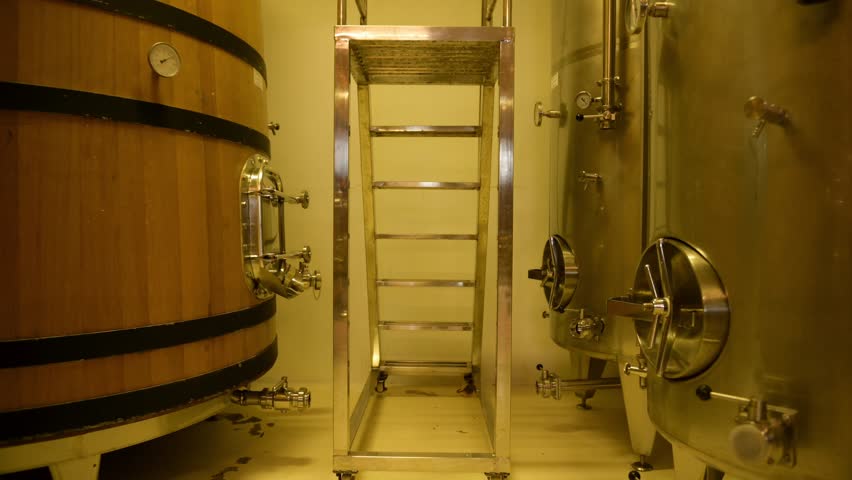 Wine fermentation tanks in modern wine factory