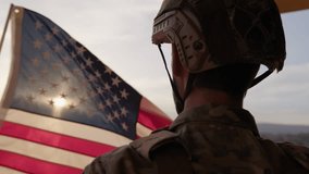 American Soldier Wears The United States Flag On War Memorial Day At Sunset - Powered by Shutterstock - Get 15% off with code: PIKWIZARD15