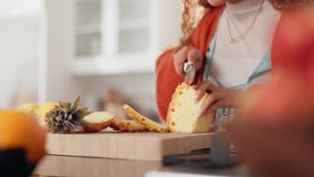 Hands, woman and cutting pineapple at kitchen for healthy snack, diet meal and nutrition. Female person, home and fruit for juice with vitamins, organic ingredients and vegan food on chopping board - Powered by Shutterstock - Get 15% off with code: PIKWIZARD15