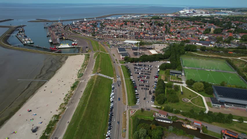 Aerial panorama around the old town of the city Harlingen in the Netherlands on a sunny day in summer	