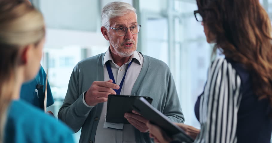 Doctors, planning and business man in hospital for medical administration, patient system and hr manager. Meeting, medicine and team with people in clinic for healthcare, nurse and insurance claim