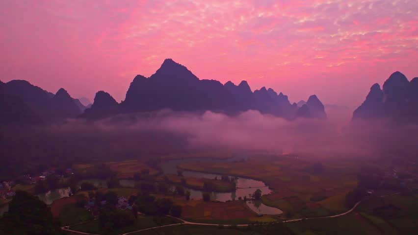 Drone aerial view of landscape mountains view in sunrise or sunset sky,High angle view over countryside at northern Vietnam