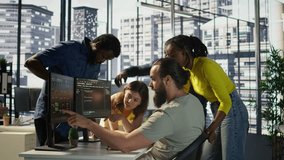 Team of software engineers doing brainstorming to create machine learning models that can process and analyze data to improve decision making processes. Colleagues working together in office, camera B - Powered by Shutterstock - Get 15% off with code: PIKWIZARD15