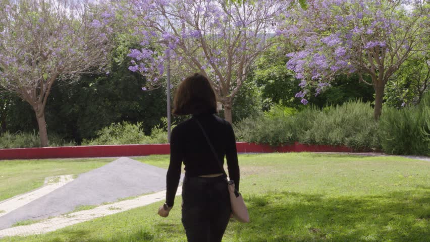 woman dancing in the park