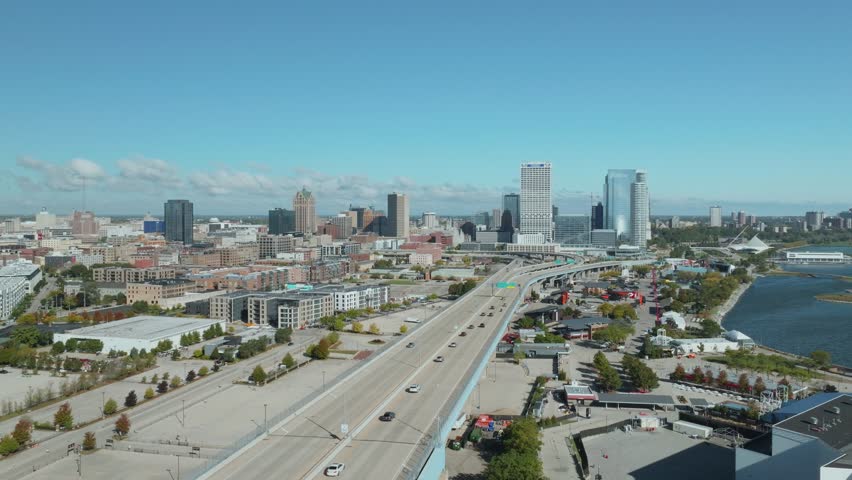 The yellow Hoan Bridge with light vehicle traffic along the Lake Michigan waterfront connects downtown Milwaukee with the more industrial south side.