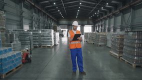 Logistics Manager Writes New Wares In Recent Shipment To Industrial Warehouse. Logistics Manager Smiles After Inspecting Shipment Goods Inventory. Shipment Delivery Check By Logistics Manager - Powered by Shutterstock - Get 15% off with code: PIKWIZARD15