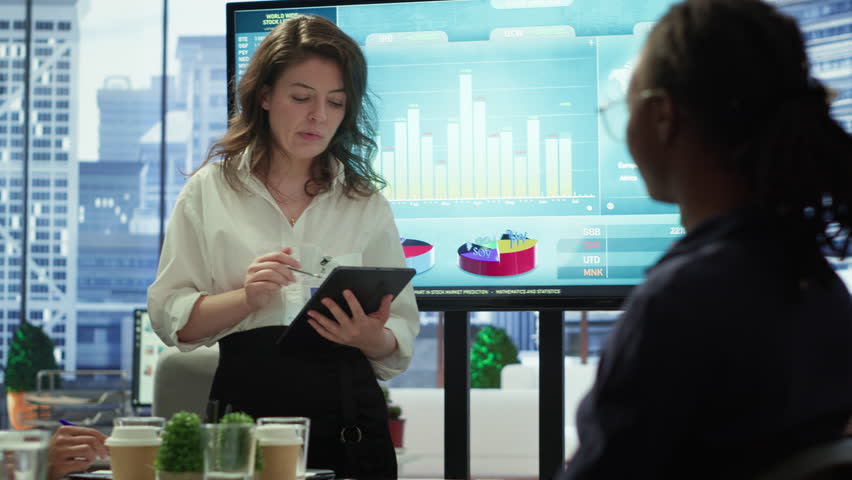 Diverse work team collaborating on project management tasks, utilizing smart technology and detailed analytics to optimize resource allocation and ensure enterprise objectives. Camera A. - Powered by Shutterstock - Get 15% off with code: PIKWIZARD15