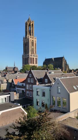 Utrecht, the Netherlands. 22 september 2024. Dom Tower and cityscape in Utrecht and historic buildings in the foreground.