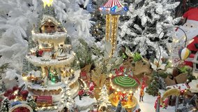  Miniature christmas village toy on christmas market with full of lights. Christmas Amusement park  - Powered by Shutterstock - Get 15% off with code: PIKWIZARD15