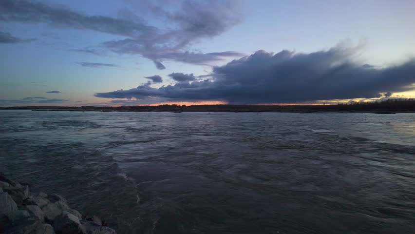 Slow motion Susitna River at Sunset in Alaska