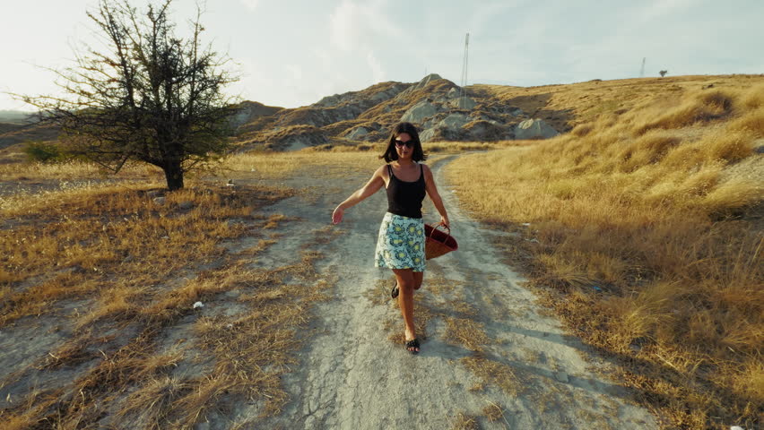 Italian Woman Walking Free In The Nature 