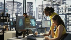 Admin assisted by coworker while utilizing cloud computing resources to train large scale machine learning models. Woman and colleague monitoring AI company systems using computer, camera B - Powered by Shutterstock - Get 15% off with code: PIKWIZARD15