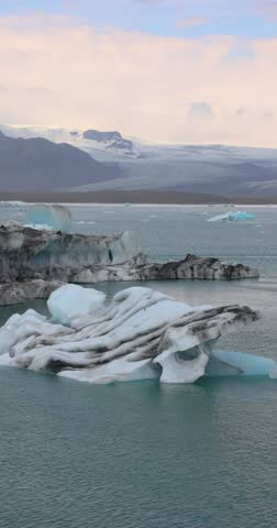 Large Icebergs Sailing shot pass floating Icebergs in Antarctica Sea 