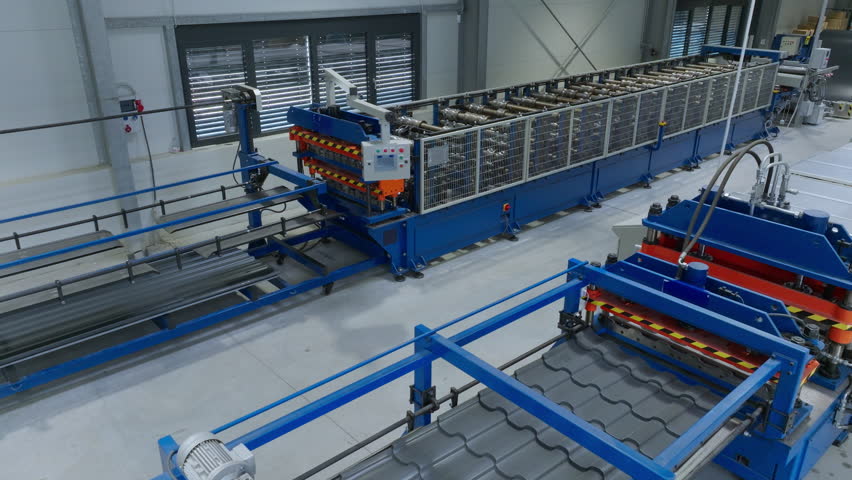 Manufacturing facility employing cutting-edge technology, automated metal shaping machines, aerial shot. Streamlining production processes concept.