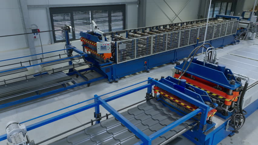 Manufacturing facility employing cutting-edge technology, automated metal shaping machines, aerial shot. Streamlining production processes concept.
