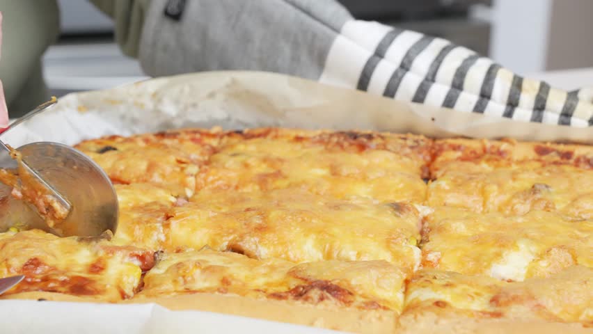 Homemade square pizza with cheese and sausage topping served on wooden table Square pizza, full cheese spread organic pizza healthy pizza