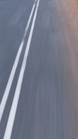 black car driving fast on highway