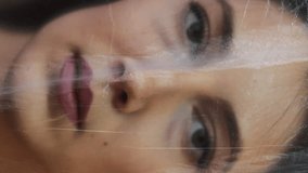 Vertical video. Artistic portrait of woman with closed eyes blending realism dreamlike surrealism highlighting serenity and beauty. - Powered by Shutterstock - Get 15% off with code: PIKWIZARD15