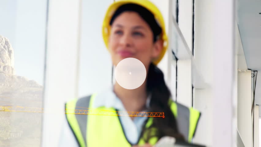 Animation of network of communication icons over happy biracial female architect in hard hat. Connection, architecture, engineering, work, network and communication, digitally generated video. - Powered by Shutterstock - Get 15% off with code: PIKWIZARD15