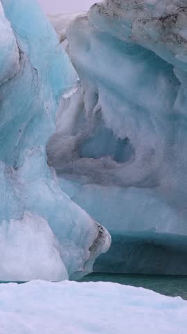Icebergs from melting glacier in Iceland, Arctic nature ice landscape in Unesco World Heritage Site - Climate Change and Global Warming