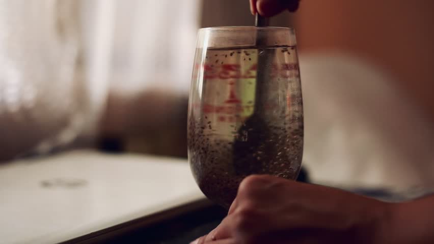 Stirring Chia seed in a glass