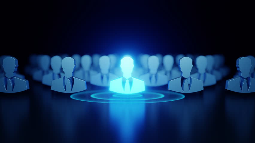 A glowing human figure stands out among identical silhouettes, symbolizing leadership, individuality, or human resource selection.