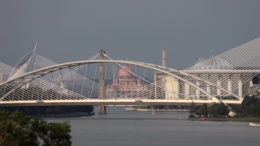 Lake Putrajaya in Malaisian capitol city – suspension bridge and mosque landmarks timelapse.

