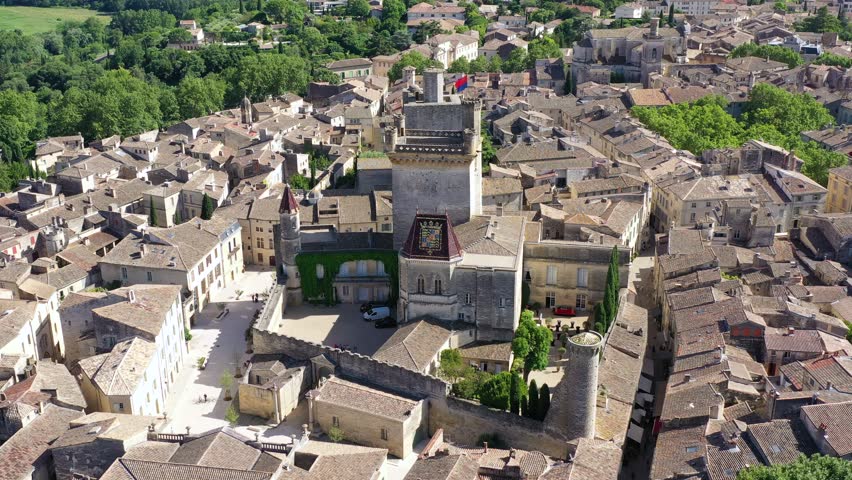 View of beautiful town of Uzes, Gard department, France. Aerial view of the historic town of Uzes, France. Historic town of Uzes with stunning aerial views of its medieval architecture, Gard, France.