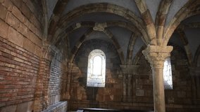 panning across ceiling of medieval building crypt church catacomb arched column design windows gothic european style (europe neoclassical) architecture - Powered by Shutterstock - Get 15% off with code: PIKWIZARD15