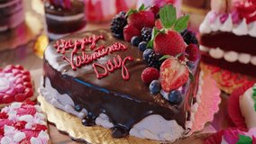 Chocolate and Strawberry Valentine Cake on a Confectionery Table. Cakes and Cookies with Red and Pink Hearts, and Love.  - Powered by Shutterstock - Get 15% off with code: PIKWIZARD15