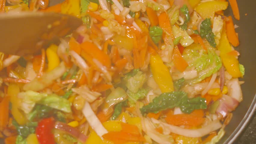 POV Point of View of Steam Rising From Hot Stir Fry Healthy Vegetables Being Cooked in Wok Pan Causing Haze on Camera Lens 4K