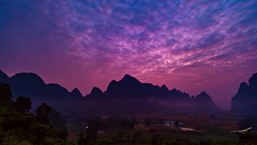 Timelapse wide angle view of landscape with rice field at Phong Nam village in Trung Khanh,Cao Bang province,Northern Vietnam,Timelapse sunrise sky and fog over mountains
