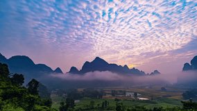 Timelapse wide angle view of landscape with rice field at Phong Nam village in Trung Khanh,Cao Bang province,Northern Vietnam,Timelapse sunrise sky and fog over mountains - Powered by Shutterstock - Get 15% off with code: PIKWIZARD15