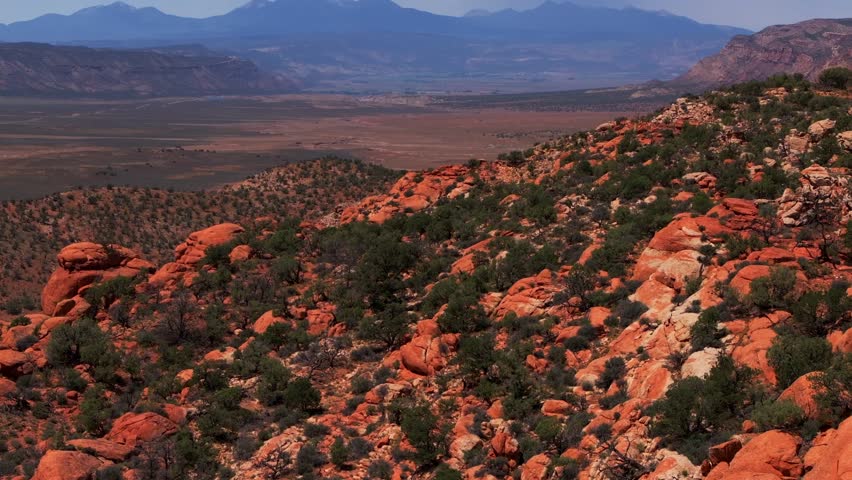 Colorado Utah Border aerial drone Moab Spanish Valley La Sal Mountain Rocky Mountains highway 90 road Telluride Montrose county summer dry Redvale Norwood rain thunderstorm clouds sunny forward pan