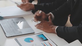 Business Financial Analysts Collaborating Using Digital Tablets to Analyze Reports and Plan Investment Projects, Engaging in a Corporate Meeting to Discuss Team Success and Share the Results - Powered by Shutterstock - Get 15% off with code: PIKWIZARD15