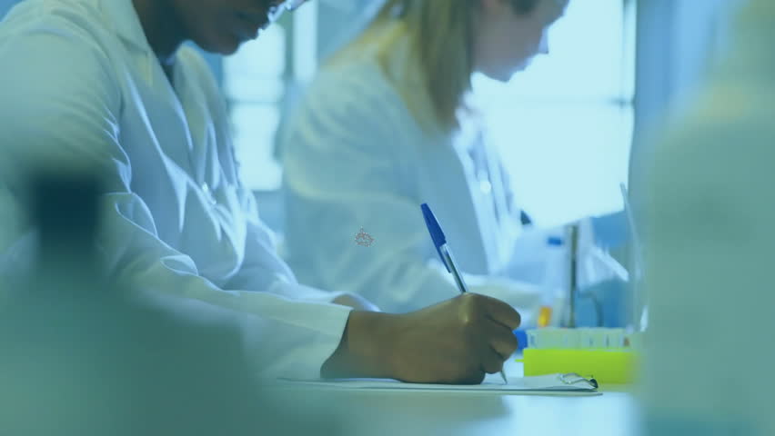 Animation of network of medical icons over diverse female scientists working at laboratory. Connection, science, medical research, digital interface and communication, digitally generated video. - Powered by Shutterstock - Get 15% off with code: PIKWIZARD15