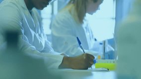 Animation of network of medical icons over diverse female scientists working at laboratory. Connection, science, medical research, digital interface and communication, digitally generated video. - Powered by Shutterstock - Get 15% off with code: PIKWIZARD15